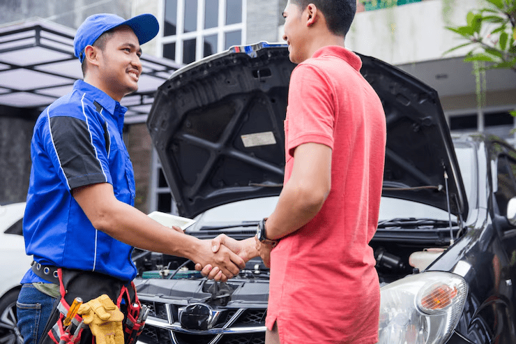 Technician shake hand with customer Technician shake hand with customer